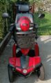 Vendo scooter elettrico di colore rosso per anziani o persone con difficoltà motorie, usato poco